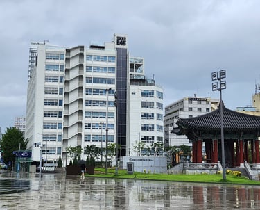 Jeonil Building 245 with the democracy bell in the foreground