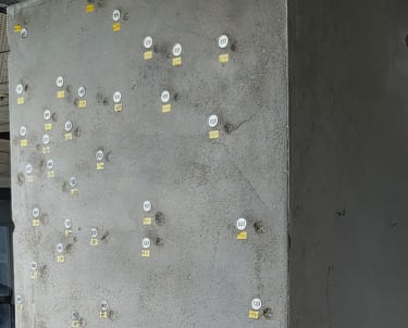 Supporting beam showing many bullet holes