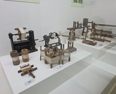 Display of silk making artefacts