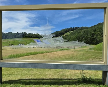 Site view will glass etched overlay of temple