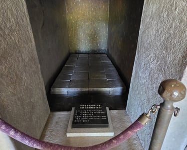The Inside of a full size replica stone tomb