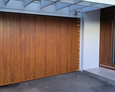 Insulated garage door upgrade improving home efficiency, Auckland, New Zealand