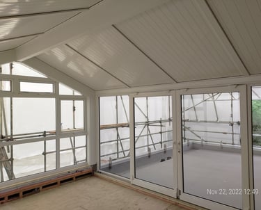 Modern UPVC conservatory with glass roof extending Auckland home living space, New Zealand