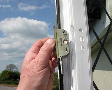 picture of a upvc window lock being replaced