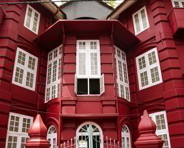 Koder House is a heritage hotel with a magnificent three-storied structure in brick-red at Fort Kochi.