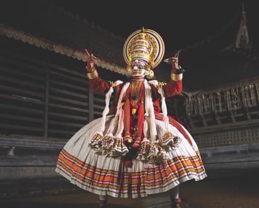 Kathakali dancer performing at a temple in Kerala
