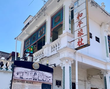 peace hotel taiping building and sign
