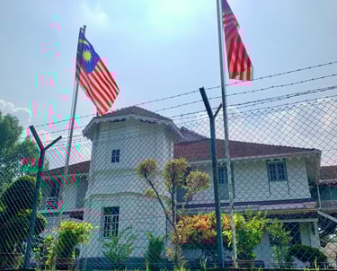 taiping heritage trail district officer residence building malaysia flag