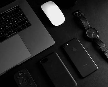 laptop phone mouse and watch