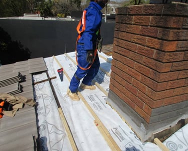 Chimney area precision batten work laying to accommodate new roof tiles, Hyde Park, Sandton
