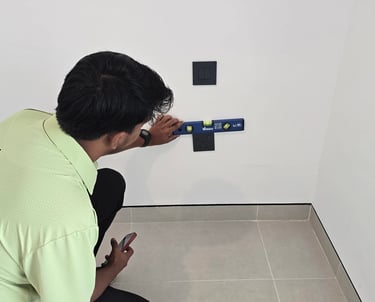 The Snag Master engineer checking levelling using spirit level tool