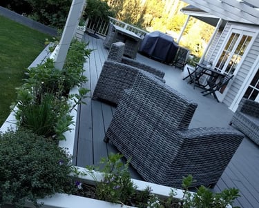 Deck, planter boxes and pergola created to match existing house.