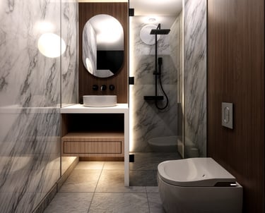 Baño con mármol, espejo redondo y ducha tipo spa.