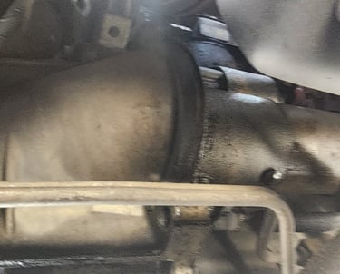 Starter motor inside a vehicle engine