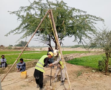 a group of people standing around a wooden structure