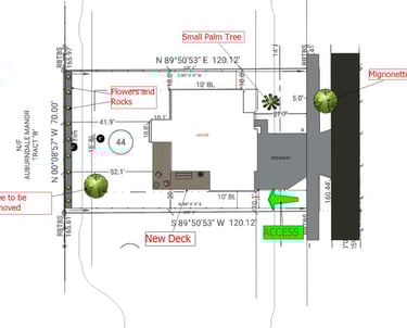 Site plan for residential landscaping showing a new deck, driveway, and tree removal locations.