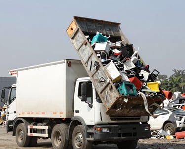 A friendly Limpiatex team member loading a truck with yard waste on a sunny Texas day.