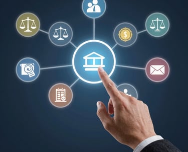 Modern office desk with laptop and legal books, illuminated by warm golden light.