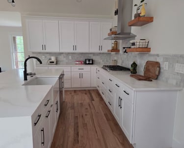 Modern kitchen layout with open flow, smart storage, sleek surfaces, and integrated appliances.