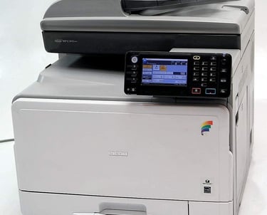 a printer machine with a printer on top of it