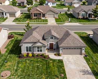 white quadcopter drone flying near snow mountain during daytime