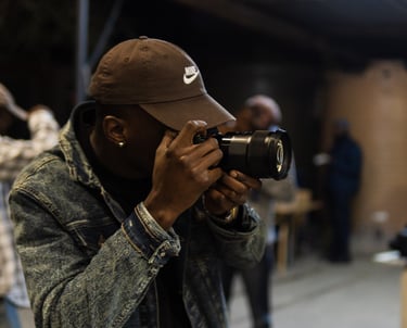 Peinge nakale taking a picture at an event
