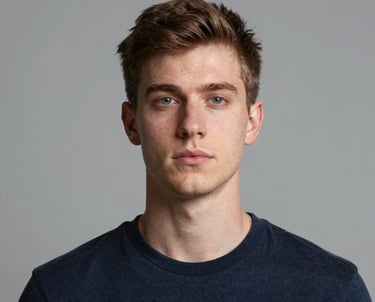 man standing near white wall
