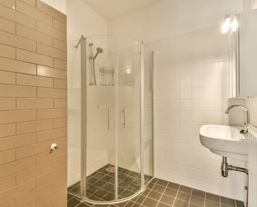 Shower water leak causing bathroom floor damage