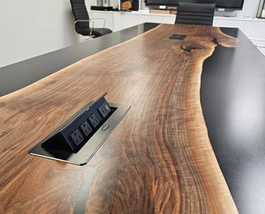 Black walnut epoxy river table with integrated power ports