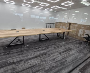 21ft x 4.5ft maple boardroom table — installed boardroom view