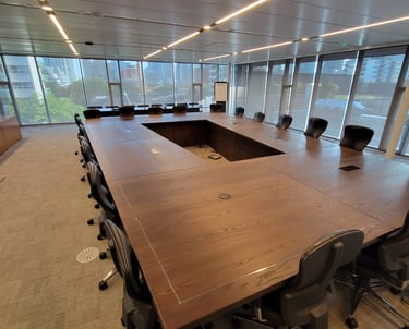22ft x 14ft custom white ash conference table built for ETFO — corner