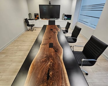 12ft x 3.5ft black walnut epoxy river boardroom table — 4Point Management