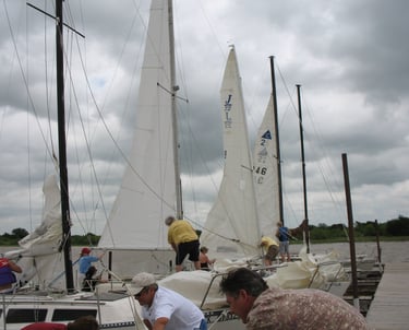 Skippers preparing for race day at the Wichita Falls Sailing Club, Lake Arrowhead, Texas