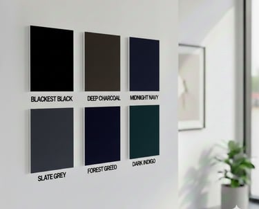 Six labeled dark color swatches displayed on a modern white wall in a bright interior room.