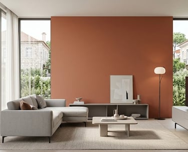 Modern living room with gray sectional sofa and plastered wall with minimalist furniture.