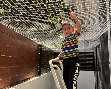 Close-up of a sturdy balcony safety net securely installed on a residential balcony in Thane.