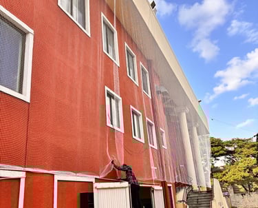 sturdy pigeon net tightly fitted around an apartment duct in Andheri West.