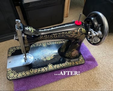 Vintage Singer 15 sewing machine with Pheasant decals resting on a purple cloth after restoration.