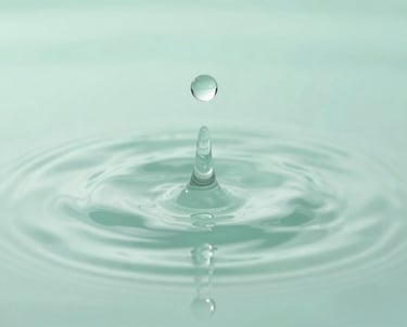 Abstract soft mint green waves gently flowing, evoking calm and clarity.