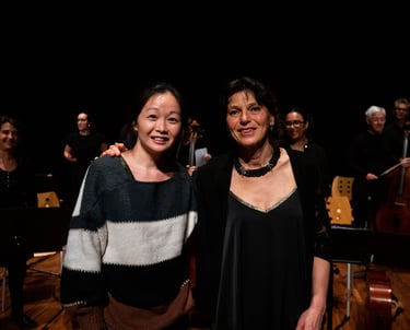 Victoire Yau with Corinne Lacour after Le Triptik concert, Acigné, with Octuor Celleizh, March 2025
