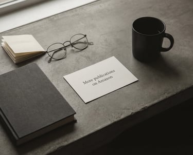 a cup of coffee and a book on a table