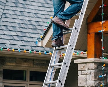 Professional roofline Christmas light installation on a Michigan home