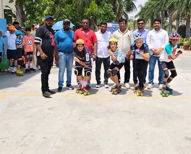 Students in safety gear prepare for a roller skating competition at a public school sports event.