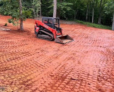 skid steer and final graded yard