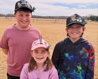 3 kids wearing hats with patches, chains and BrimPets
