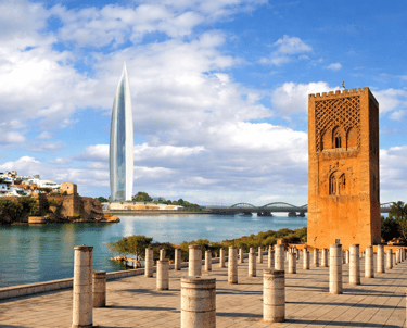 a clock tower with a view of a city
