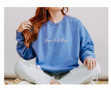custom embroidered sweatshirt with personalized script text.