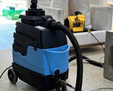 Founder of Rocky Clean is cleaning couch in Denver, CO