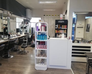 a salon salon with a hair dryer and a hair dryer