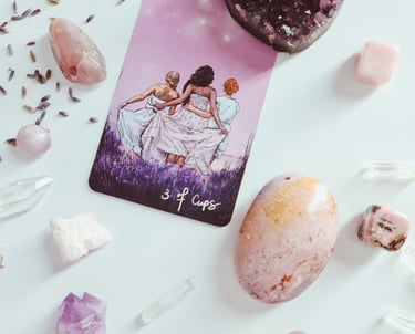 Tarot card, crystals and lavendar. Photo by Edz Norton on Unsplash